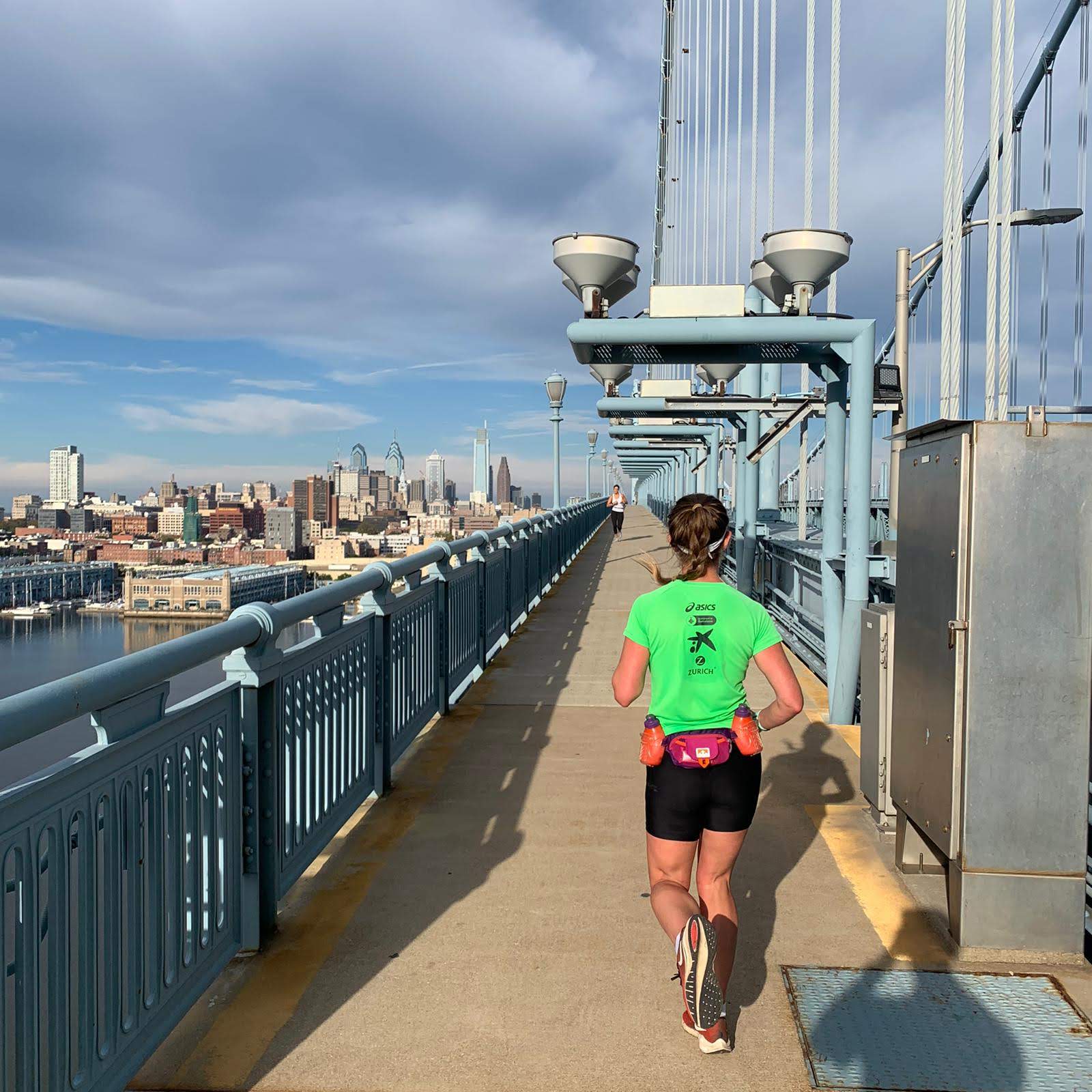 Chelsea running over bridge